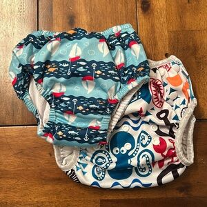 Two-pack swim diapers 3T and one is adjustable